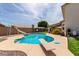 Backyard pool with slide and diving board, perfect for summer fun at 2643 E Menlo St, Mesa, AZ 85213
