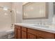Bathroom with a vanity, sink, and bathtub at 26860 N 102Nd Ln, Peoria, AZ 85383