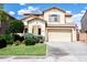Charming two-story home featuring a well-manicured front yard and attached two car garage at 29339 N 67Th Ave, Peoria, AZ 85383