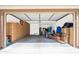 Organized garage with built-in storage cabinets, ample space, and an open entrance at 29339 N 67Th Ave, Peoria, AZ 85383