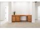 Dedicated office space with built-in wood desk and ample storage at 29339 N 67Th Ave, Peoria, AZ 85383