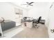 Bright office space with ample shelving, and neutral colors, perfect for productivity and organization at 29339 N 67Th Ave, Peoria, AZ 85383