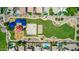 Aerial view of the community park, showing walking trails, volleyball and basketball courts at 3256 E Maplewood St, Gilbert, AZ 85297