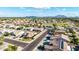 Scenic aerial view of a quiet neighborhood with well-maintained homes and lush landscaping at 3256 E Maplewood St, Gilbert, AZ 85297