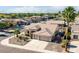 Well-maintained home showcasing a neat front yard, desert landscaping, and a three-car driveway at 3256 E Maplewood St, Gilbert, AZ 85297
