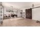 Open floorplan featuring tile floors, neutral paint, and a rustic sliding barn door at 3256 E Maplewood St, Gilbert, AZ 85297