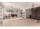 Bright open floorplan offering tile floors, neutral paint, and modern light fixtures at 3256 E Maplewood St, Gilbert, AZ 85297