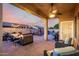 Outdoor patio featuring a cozy seating area with a fire pit and string lights at 3256 E Maplewood St, Gilbert, AZ 85297