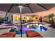Resort-style backyard features a large pool with spa and lounge chairs perfect for relaxation at 3256 E Maplewood St, Gilbert, AZ 85297