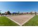 Community volleyball court with net and green grass at 3256 E Maplewood St, Gilbert, AZ 85297