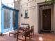 Inviting outdoor patio with comfortable seating, string lights, and stylish decor, creating a cozy and relaxing atmosphere at 3261 S Sunland Dr, Chandler, AZ 85248