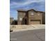 Charming two-story home featuring a two-car garage, low maintenance landscaping, and a tile roof at 3825 S 60 Dr, Phoenix, AZ 85043