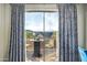 Balcony view featuring neighborhood scenery, mountain vistas, a seating area, and privacy curtains at 3830 N Red Sky Cir, Mesa, AZ 85207