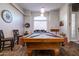 Entertaining game room features a pool table, ample lighting, and decorative accents at 3830 N Red Sky Cir, Mesa, AZ 85207