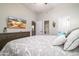 Spacious main bedroom with TV, closet and ensuite bathroom access at 3830 N Red Sky Cir, Mesa, AZ 85207