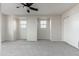 Spacious bedroom featuring neutral carpet, recessed lighting, and two windows offering pleasant natural light at 4030 E Prickly Pear Trl, Phoenix, AZ 85050