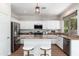Well-equipped kitchen with sleek appliances, ample cabinet space, and bar seating at 4030 E Prickly Pear Trl, Phoenix, AZ 85050