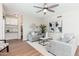 Spacious living room with neutral colors, hardwood floors, and a ceiling fan at 4030 E Prickly Pear Trl, Phoenix, AZ 85050
