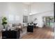 Open-concept living space filled with modern furniture and lots of natural light at 4030 E Prickly Pear Trl, Phoenix, AZ 85050