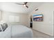 Spacious main bedroom featuring a ceiling fan and view of the bathroom at 4030 E Prickly Pear Trl, Phoenix, AZ 85050