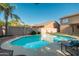 Inviting backyard pool with a tanning ledge, perfect for relaxing on sunny days at 4030 E Prickly Pear Trl, Phoenix, AZ 85050