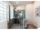 Beautiful walk-in shower features glass door, tile surround, and tiled floors at 4030 E Prickly Pear Trl, Phoenix, AZ 85050