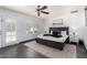 Inviting bedroom featuring a ceiling fan, neutral decor and door leading to pool at 4556 E Paradise Ln, Phoenix, AZ 85032