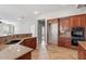 Kitchen with wood cabinets and granite countertops at 4589 N 154Th Ave, Goodyear, AZ 85395