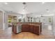Kitchen island featuring tile floors, stainless steel appliances, and a convenient sink at 4589 N 154Th Ave, Goodyear, AZ 85395