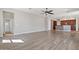 Open living space with hardwood floors and access to the kitchen and bathroom at 4589 N 154Th Ave, Goodyear, AZ 85395
