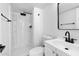 Modern bathroom featuring a walk-in shower and sleek fixtures, creating a clean and stylish space at 4629 E Southern Ave, Phoenix, AZ 85042