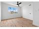 Bedroom featuring hardwood floors, bright natural light and neutral walls at 4629 E Southern Ave, Phoenix, AZ 85042