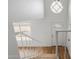 Bright entryway boasting a high ceiling, white interior, wood floors, and a modern front door at 4629 E Southern Ave, Phoenix, AZ 85042