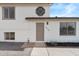 Charming home entrance featuring a neutral-colored door and well-manicured gravel landscaping at 4629 E Southern Ave, Phoenix, AZ 85042