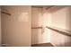 Walk-in closet featuring custom shelving and ample space at 4747 E Narrowleaf Dr, Gilbert, AZ 85298