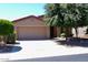 A lovely single-story home boasting desert landscaping and a two-car garage at 4747 E Narrowleaf Dr, Gilbert, AZ 85298