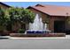 Exterior fountain with a blue tiled basin in front of a well-maintained building, adding a touch of elegance at 4747 E Narrowleaf Dr, Gilbert, AZ 85298