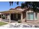 Covered patio with pergola, neutral color scheme, and desert landscaping at 4747 E Narrowleaf Dr, Gilbert, AZ 85298