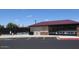 Full view of the tennis complex with courts and the Trilogy Tennis Complex building, promoting an active lifestyle at 4747 E Narrowleaf Dr, Gilbert, AZ 85298