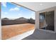 Covered patio with view to the backyard and mountain view at 4811 W Hunter Trl, San Tan Valley, AZ 85144