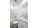 Bathroom featuring white fixtures, vanity with mirror, and shower-tub combo at 4811 W Hunter Trl, San Tan Valley, AZ 85144