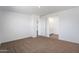 Neutral bedroom with carpet flooring and ample natural light at 4811 W Hunter Trl, San Tan Valley, AZ 85144