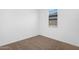 Empty bedroom featuring neutral carpet, window with blinds, and white walls at 4811 W Hunter Trl, San Tan Valley, AZ 85144