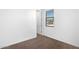 Bright bedroom featuring neutral carpet, window with blinds, and a closet at 4811 W Hunter Trl, San Tan Valley, AZ 85144