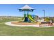 Beautifully designed neighborhood playground with slides, climbing equipment, and seating areas at 4811 W Hunter Trl, San Tan Valley, AZ 85144