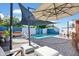 Stunning backyard pool area with comfortable seating, perfect for relaxation and enjoying the outdoors at 502 W Windsor Ave, Phoenix, AZ 85003