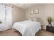 Comfortable bedroom featuring neutral tones, soft textures, and a peaceful ambiance at 5136 E Evergreen St # 1142, Mesa, AZ 85205