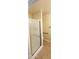 Bathroom with shower featuring glass doors, safety bar and tile floor at 5435 W Christy Dr, Glendale, AZ 85304