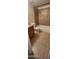 Bathroom features a tiled bathtub, toilet, and vanity with granite countertop at 5435 W Christy Dr, Glendale, AZ 85304
