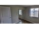 Bright bedroom with new wood laminate flooring and mirrored closet doors at 5435 W Christy Dr, Glendale, AZ 85304